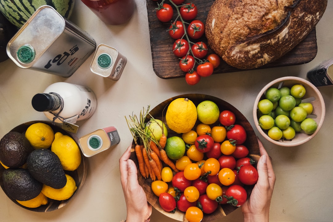 Fresh fruits and vegetables in a bowl representing healthy gut foods for natural digestion